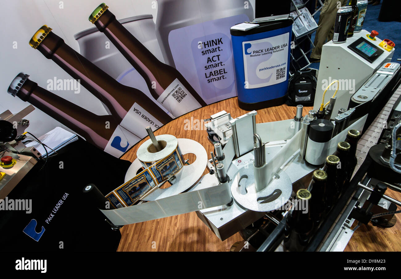 Denver, Colorado, USA. 09th Apr, 2014. A beer bottle labeling machine