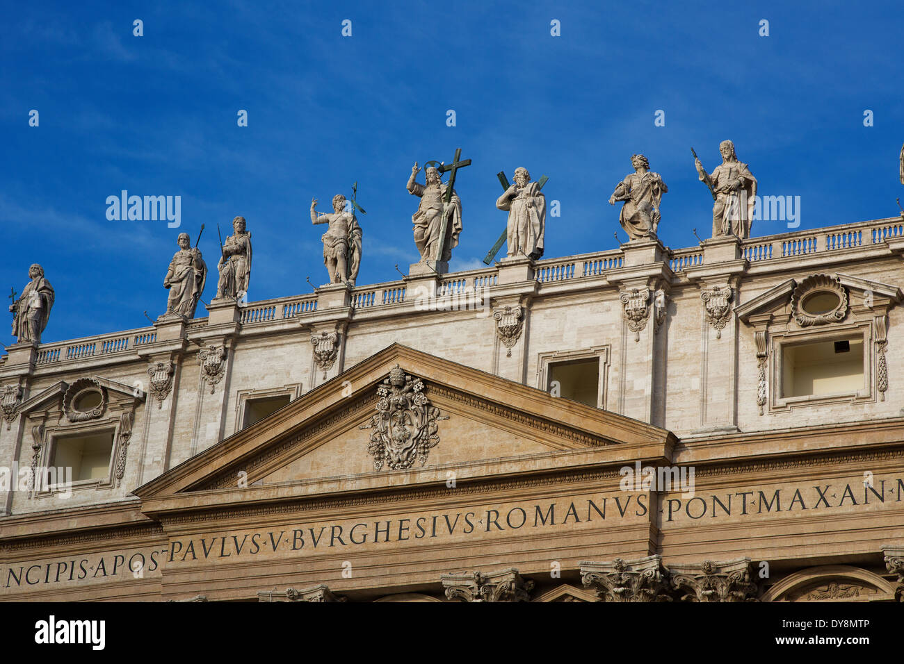 Colonnade of Bernini's sculpture atop St. Peter's Basilica at the