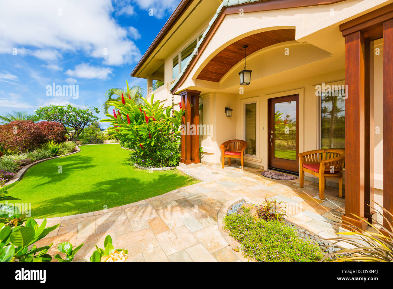 Beautiful Home Exterior, Luxury Home, Sunny Blue Sky Stock Photo