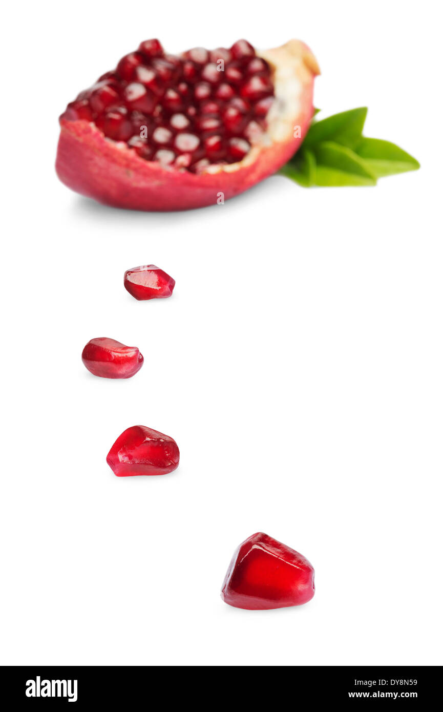 Juicy slice pomegranate fruit isolated on a white background Stock Photo