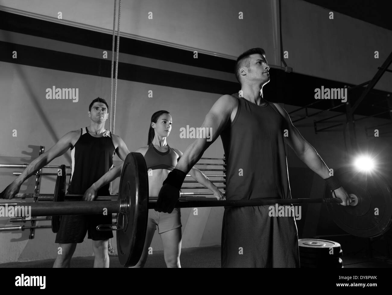 Barbell weight lifting group workout exercise at gym box Stock Photo