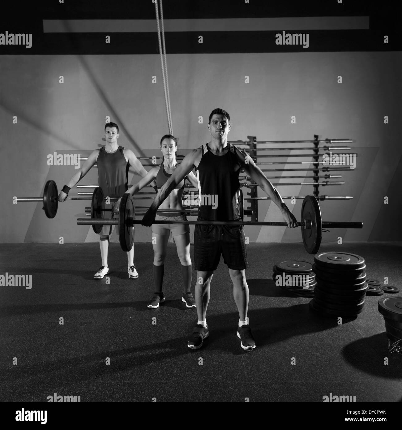 Barbell weight lifting group workout exercise at gym box Stock Photo