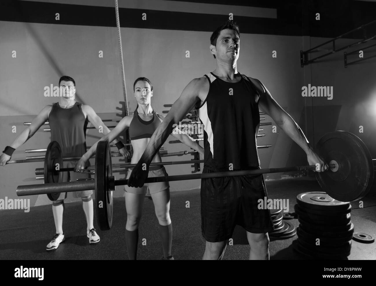 Barbell weight lifting group workout exercise at gym box Stock Photo