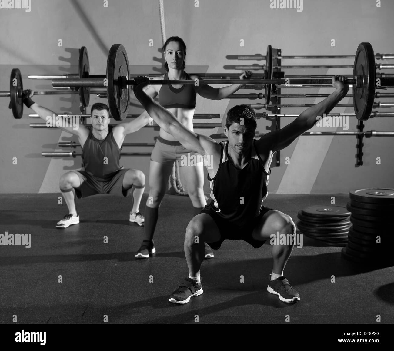 Barbell weight lifting group workout exercise at gym box Stock Photo