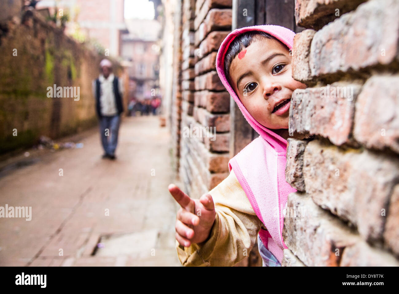 Young Napali boy in a doorway in Bhaktapur, Nepal Stock Photo