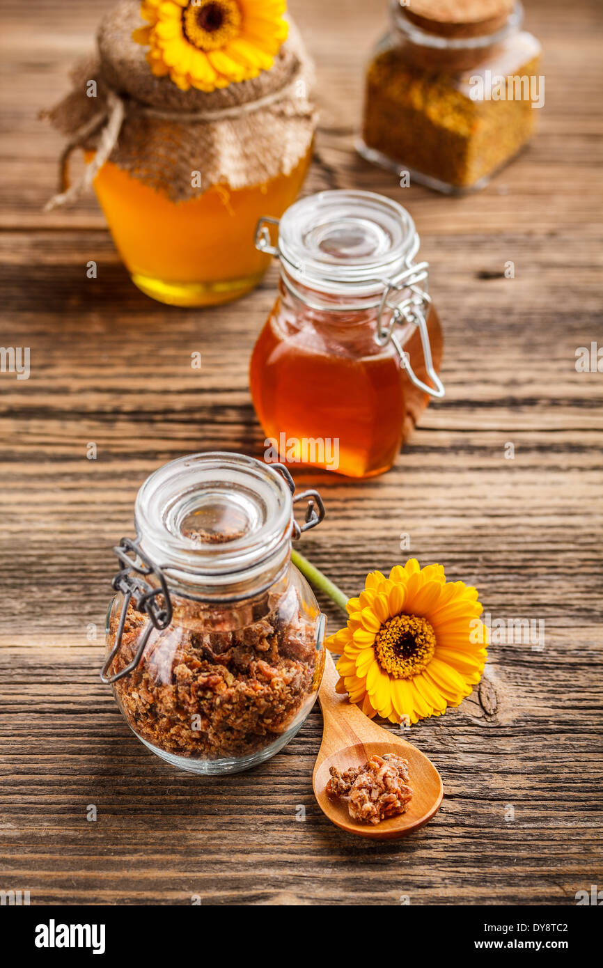 Product of bees, Propolis in glass jar Stock Photo