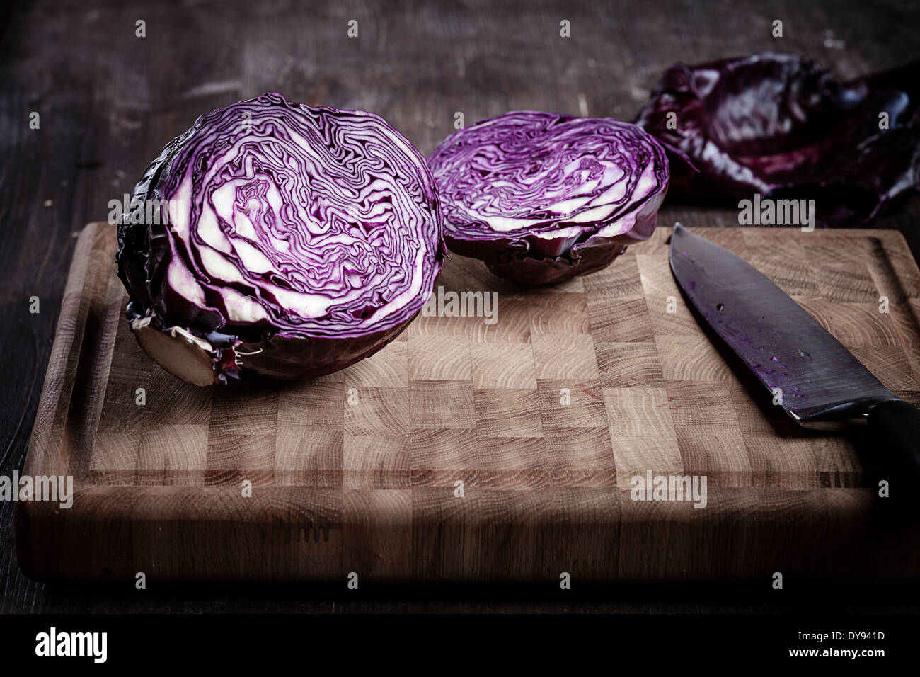 Sliced red cabbage on chopping board and knife Stock Photo Alamy