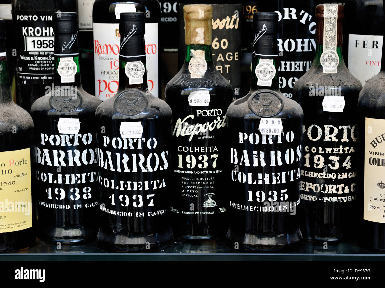 Portugal, Lisbon: Vintage port wine bottles in the window of a traditional shop Stock Photo