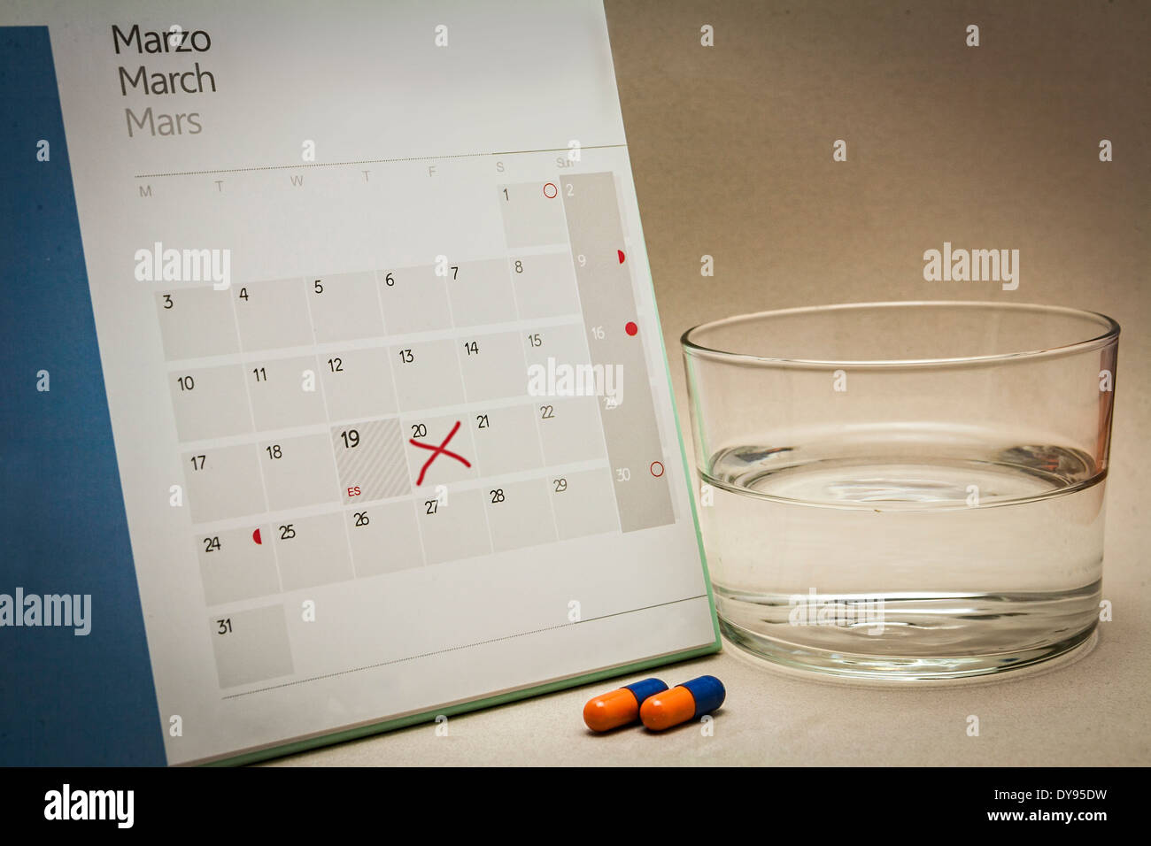 control pills on a calendar Stock Photo