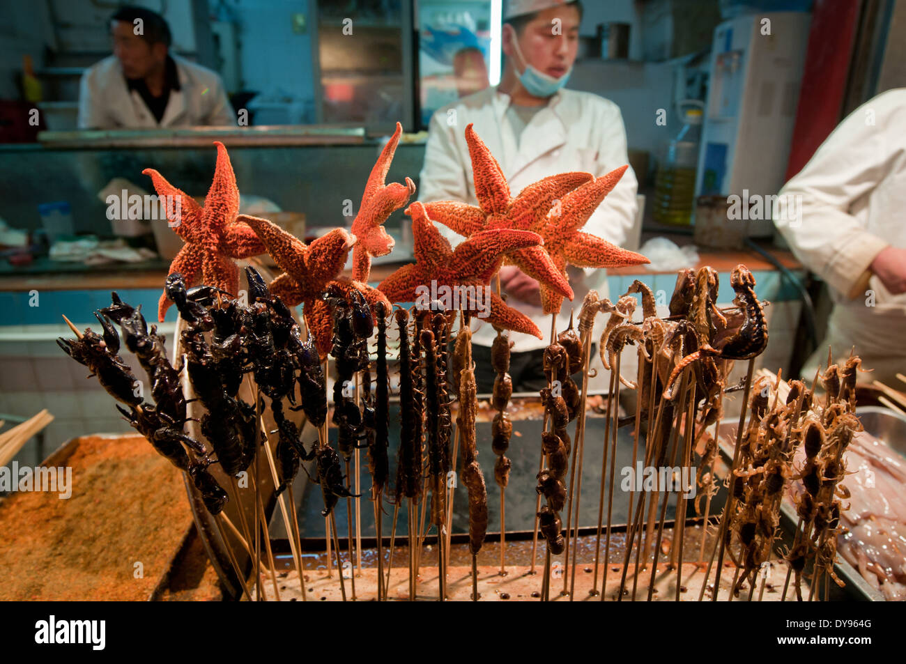rats, lizards, scorpions and starfishes on food stall at Wangfujing Snack Street in Dongcheng District, Beijing, China Stock Photo