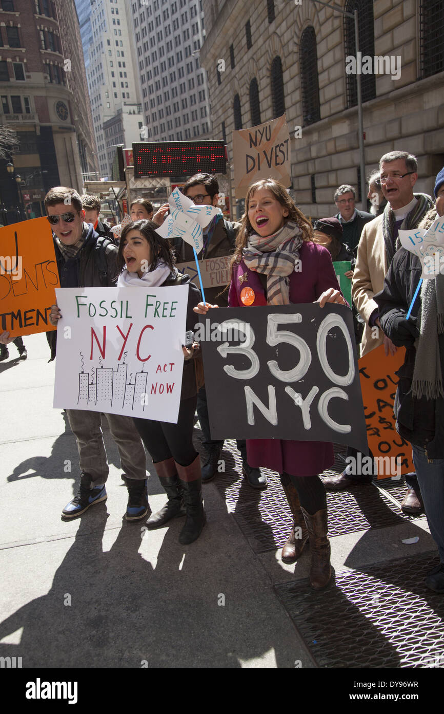 Environmental activists tell NYC comptroller to divest city worker pensions from fossil fuel companies and invest in renewables. Stock Photo