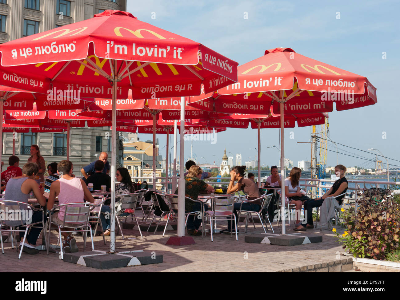 People at a Mcdonalds restaurant by the river in Kiev Ukraine Stock Photo