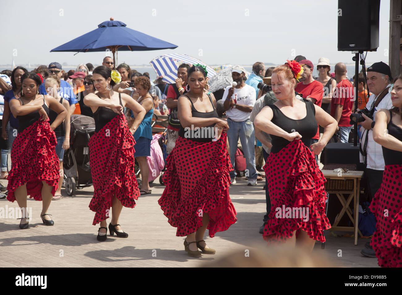 Dance group performs on the boardwalk at Coney Island, Brooklyn, NY. Stock Photo