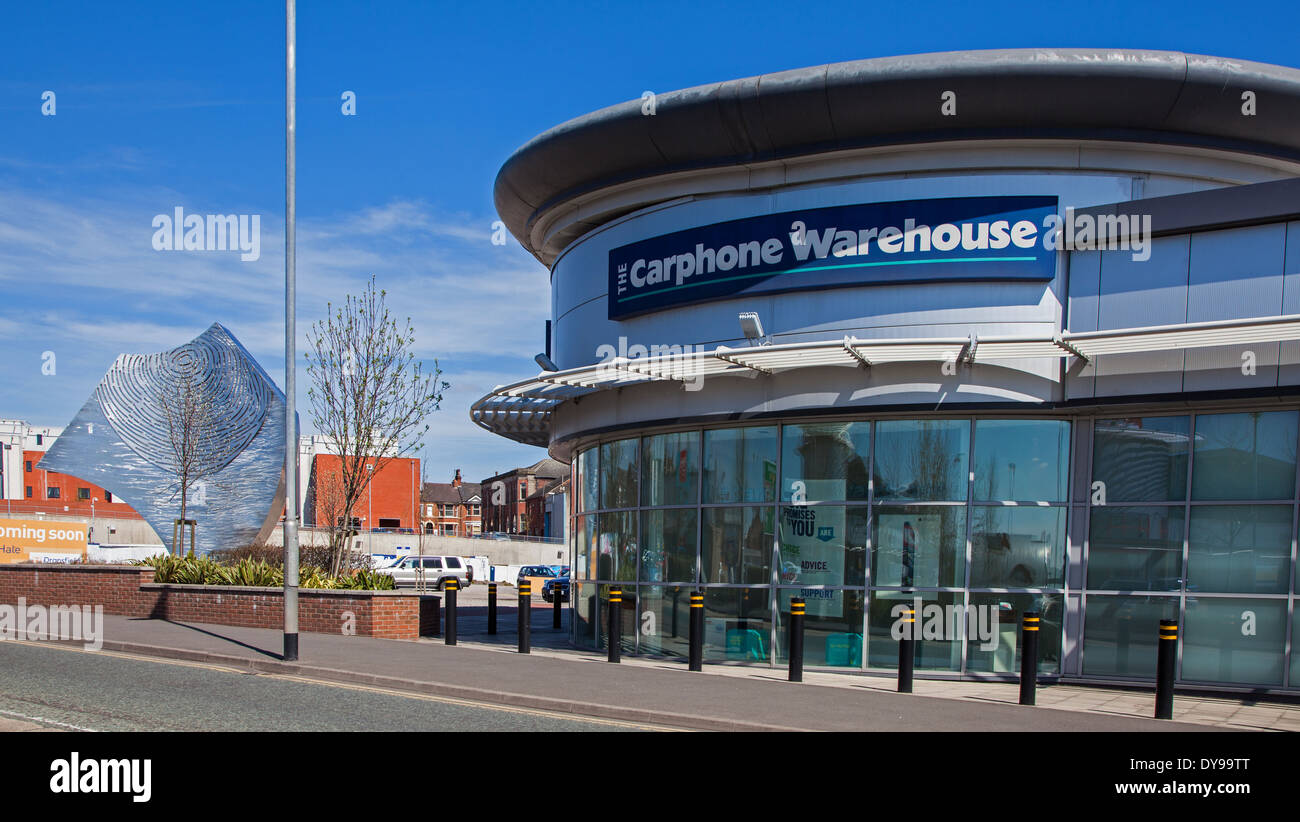 A Carphone warehouse store or shop with a sculpture next to it Stock Photo