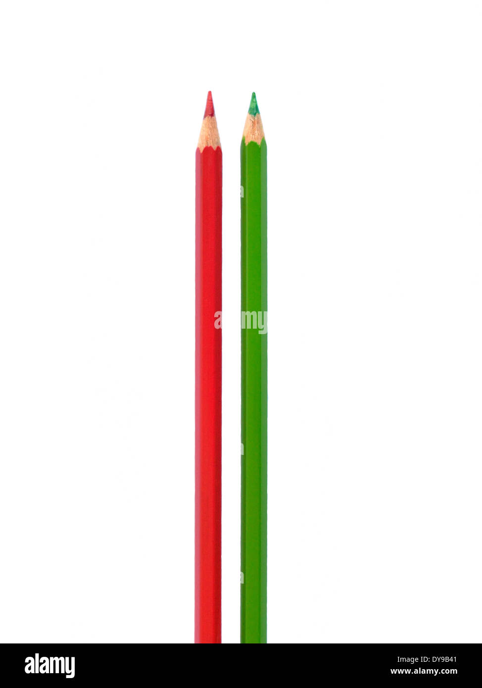 Green and red pencil on white background. Stock Photo