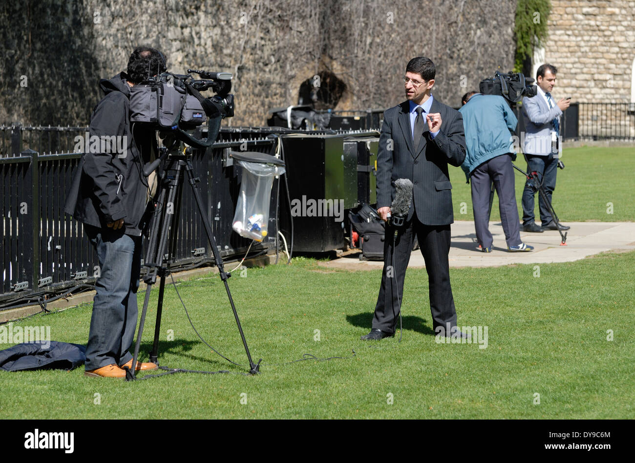 London, England, UK. Foreign TV crews on College Green by the Houses of Parliament Stock Photo