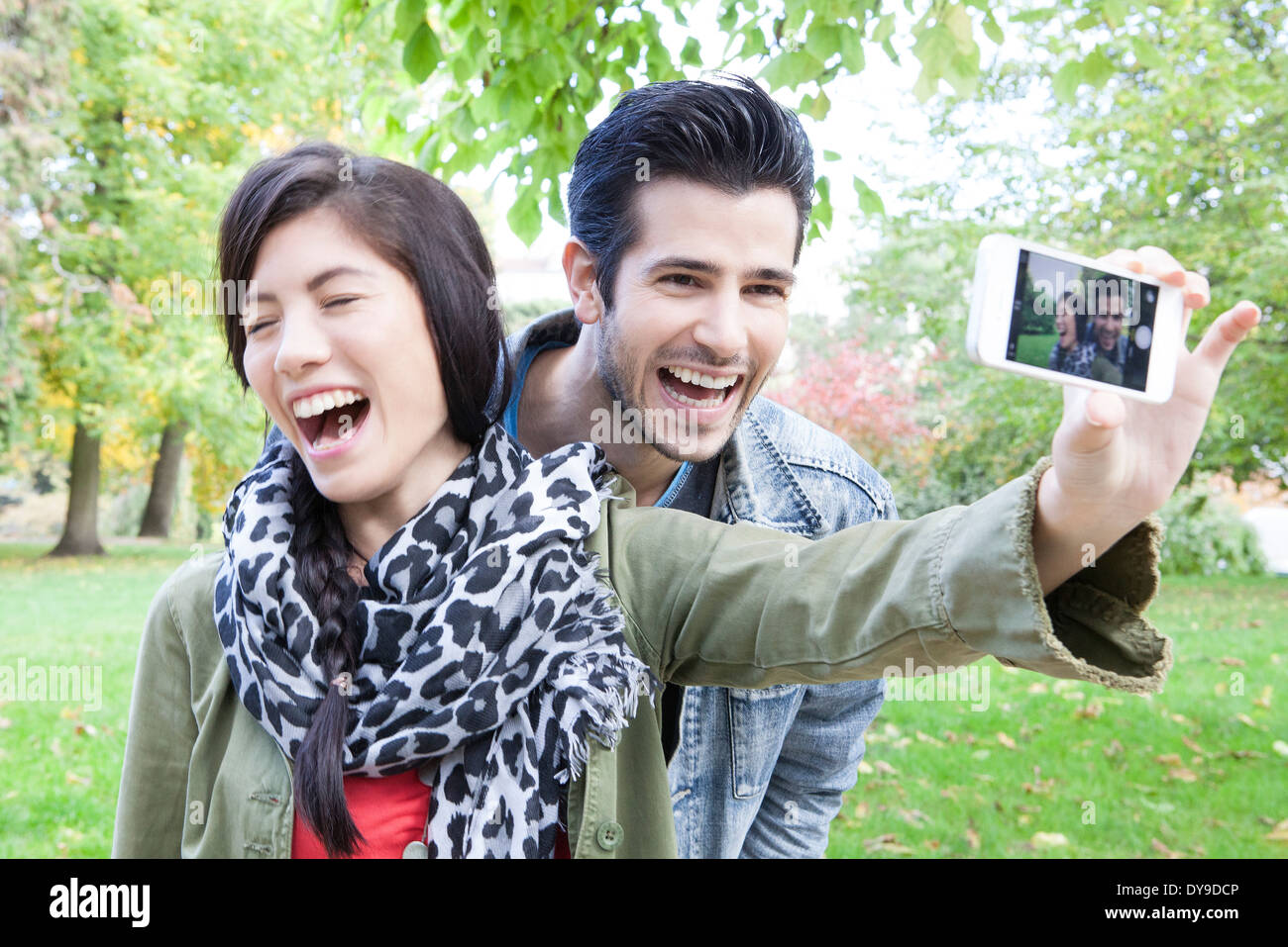 Couple taking self portrait with smartphone Stock Photo