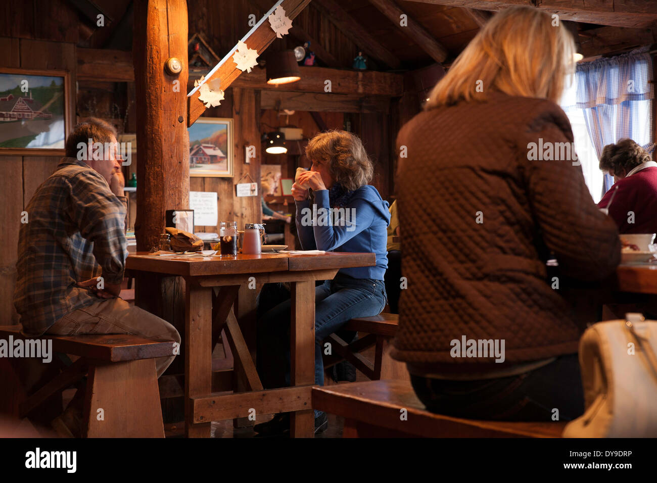 A popular New England maple syrup house restaurant offers breakfast with everything served with maple syrup and pickles. Stock Photo
