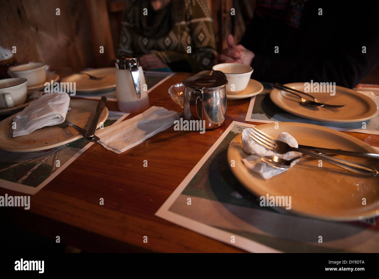 New England maple syrup house restaurant after a pancake breakfast with syrup and pickles. Stock Photo