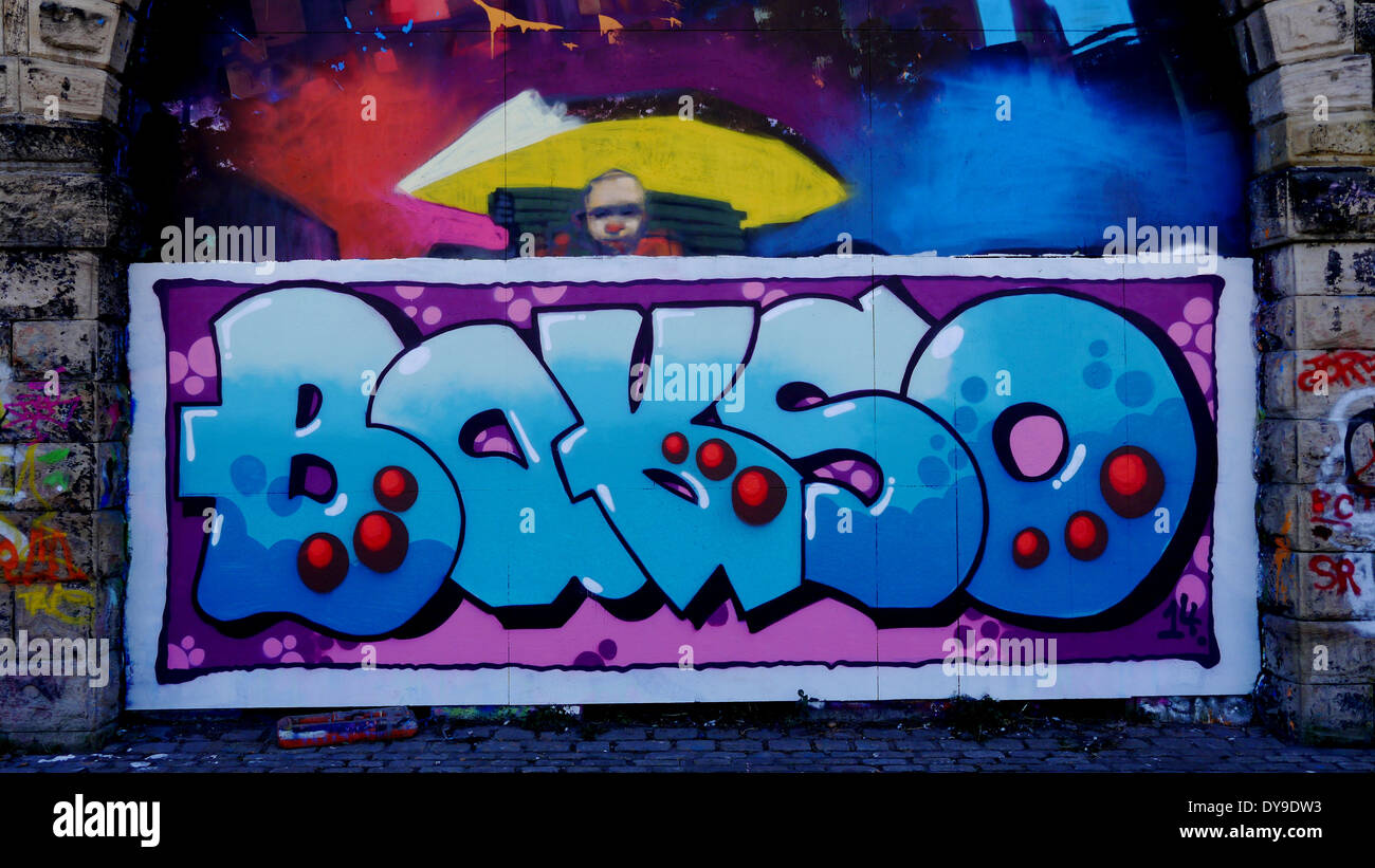 Example of colourful spray painted graffito / graffiti on wall Stock