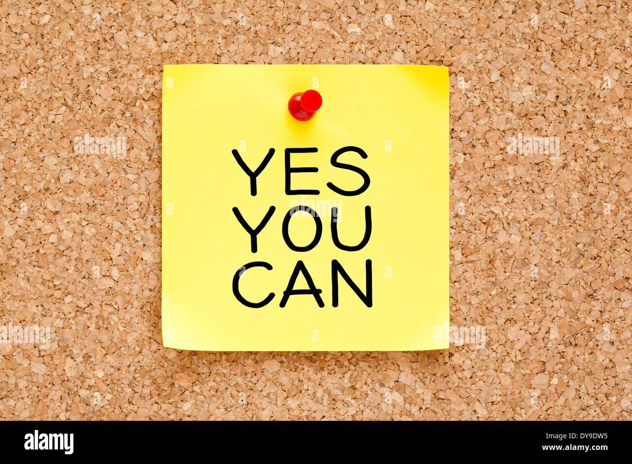 Yes You Can handwritten on yellow sticky note. Stock Photo