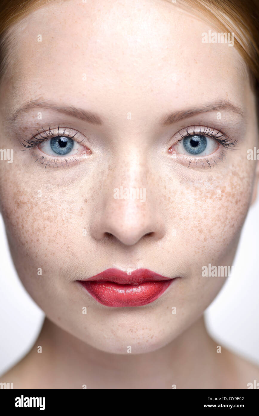 Young woman wearing red lipstick, close-up Stock Photo