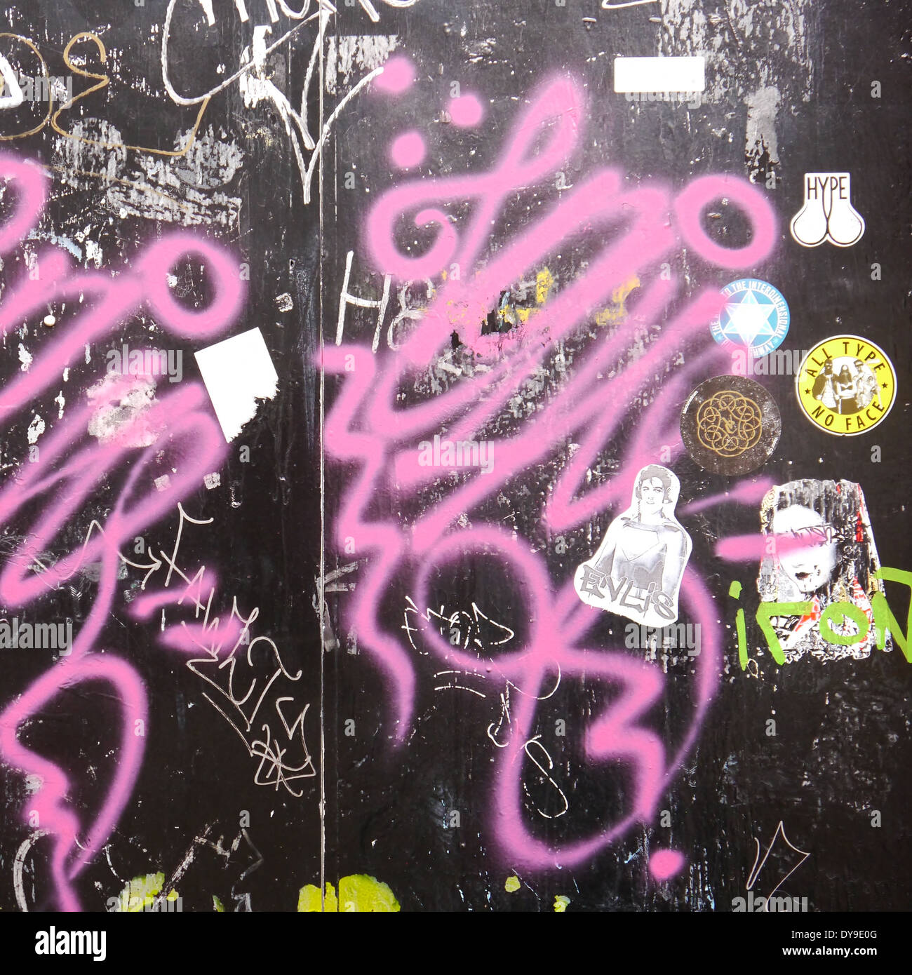 Spray painted graffito / graffiti in urban setting Stock Photo