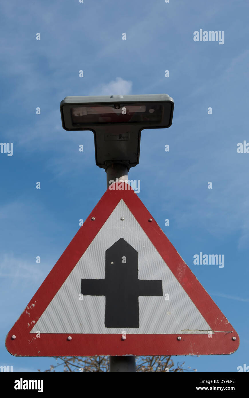 british road sign indicating a crossroads junction ahead, in barnes, southwest london, engand Stock Photo