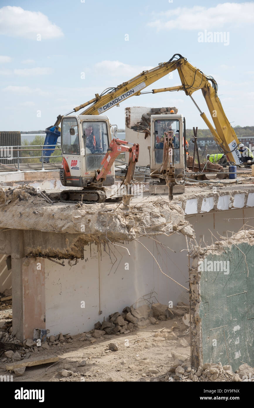 Demolition machines demolishing shops in Corby Town Centre ...