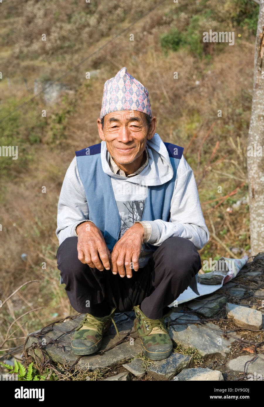 Nepali man wearing traditional Dhaka topi hat, Sarangkot, Nepal. Stock Photo