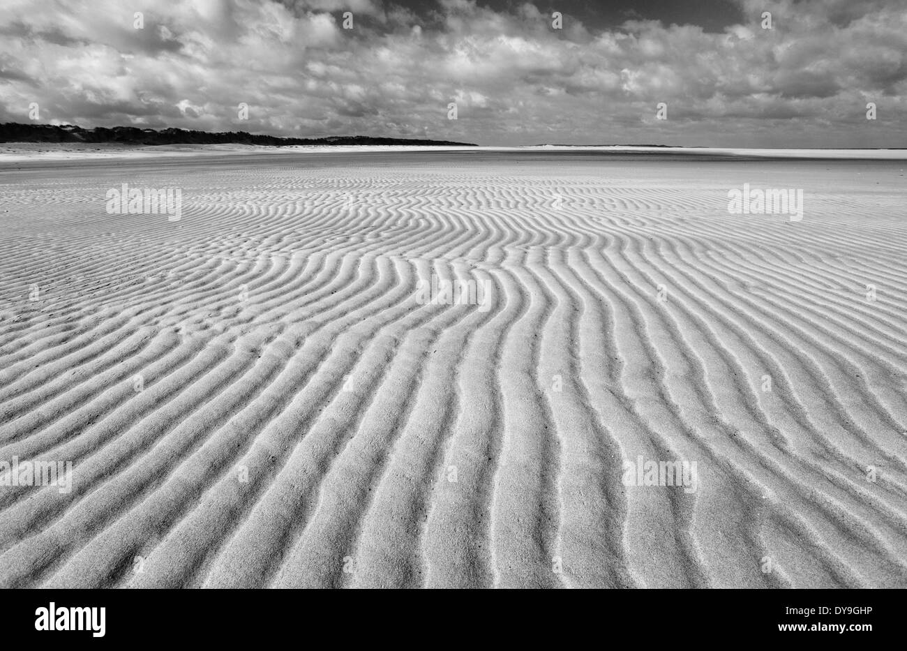 Ripples left in the sand at Burnham Overy beach on the North Norfolk coast. Stock Photo