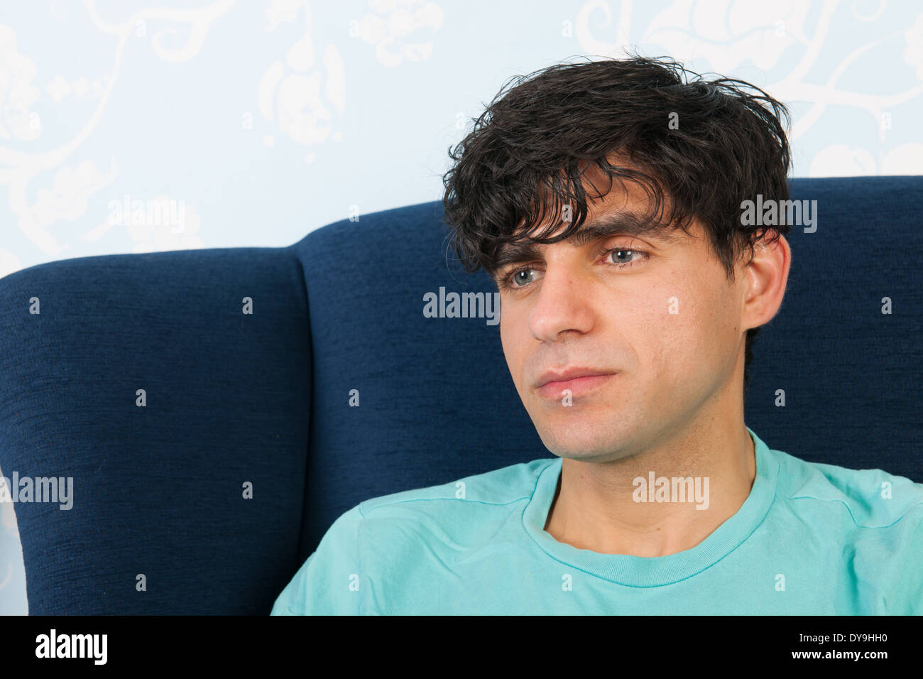Man sitting in chair and dreaming about something Stock Photo Alamy