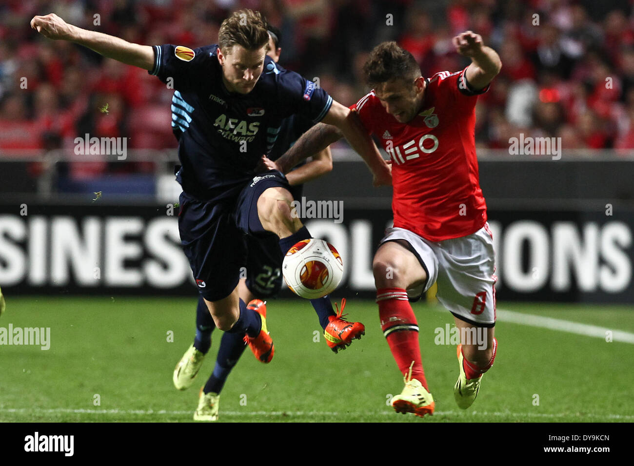 Lisbon, Portugal. 10th Apr, 2014. AZ Alkmaar's defender Mattias Johansson (L) challenges with Benfica's Serbian forward Miralem Sulejmani (R) during the match between SL Benfica from Portugal and AZ Alkmaar from Netherlands for the second leg of the Quarter-finals of UEFA Europa League, at Benfica's Luz Stadium in Lisbon, on April 10, 2014. Photo by Pedro Nunes Credit:  Action Plus Sports/Alamy Live News Stock Photo