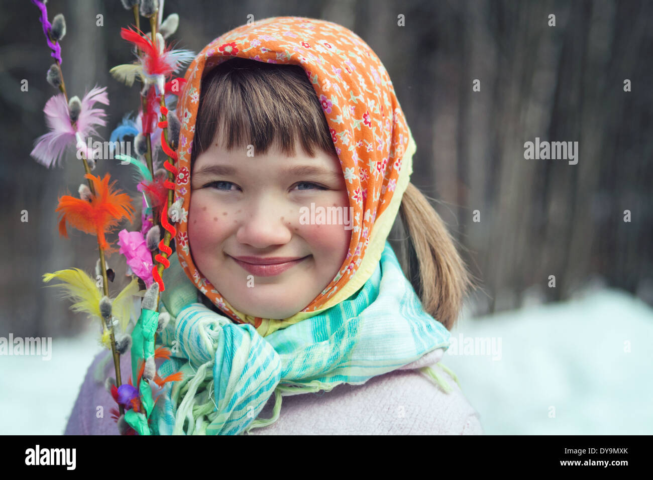 Little girl dressed as an Easter witch with decorated willow brances- Scandinavian tradition for Easter Stock Photo