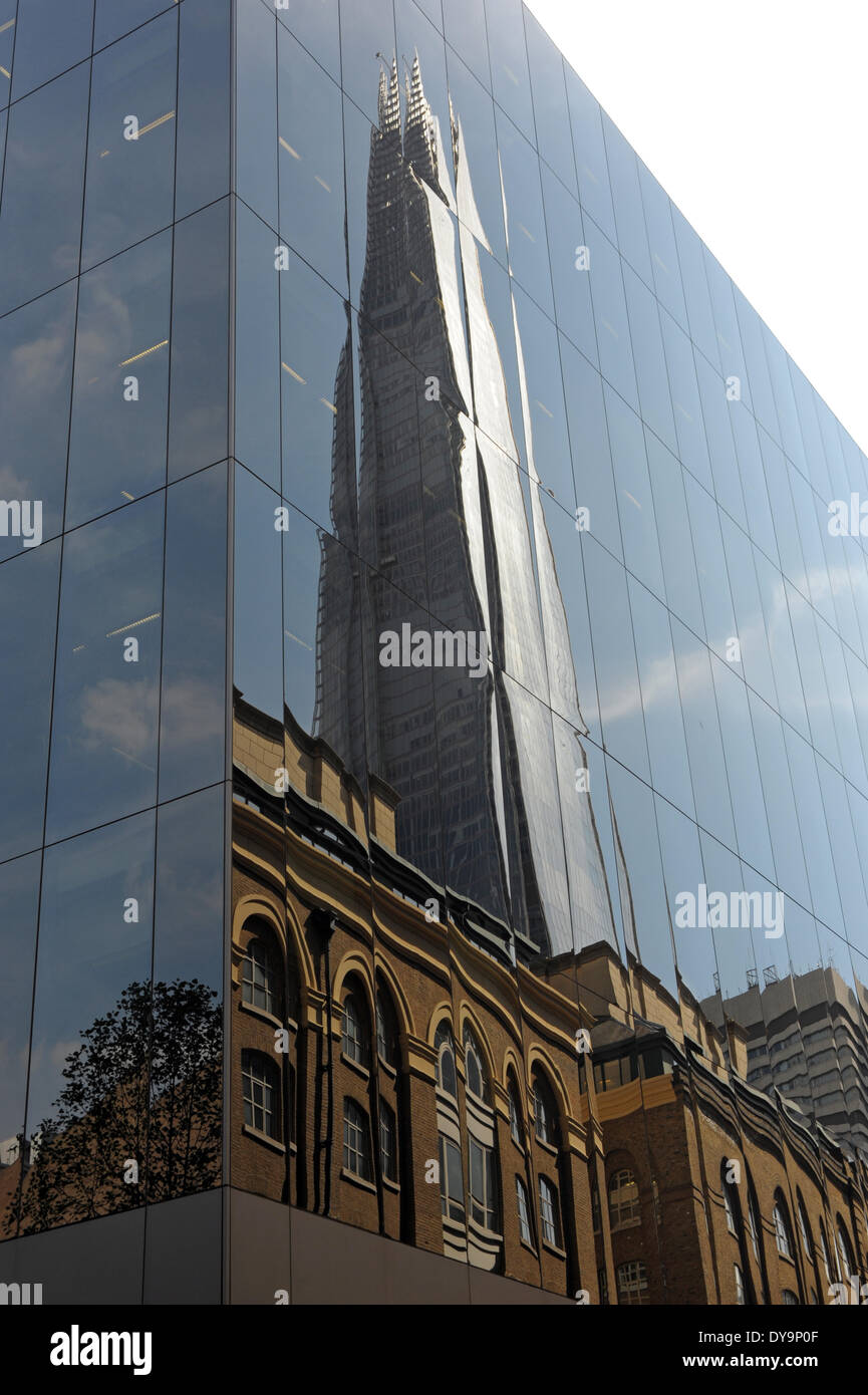 London, UK. 10 April 2014, Reflection of Shard in 6 More London Place building on a sunny day in the capital. Credit:  JOHNNY ARMSTEAD/Alamy Live News Stock Photo