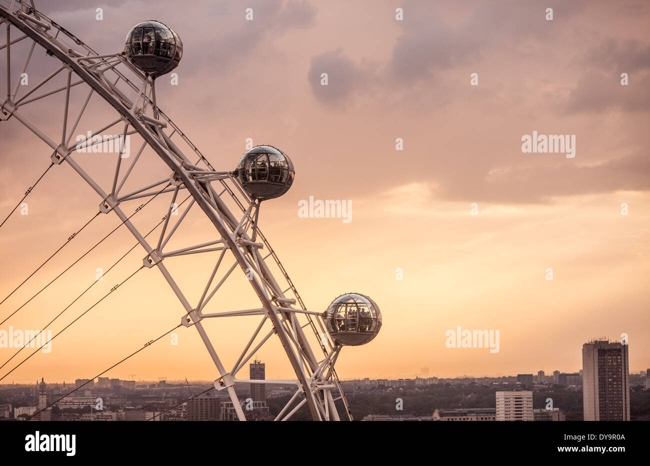 A close-up shot of the London Eye wheel against a dramatic sky Stock Photo