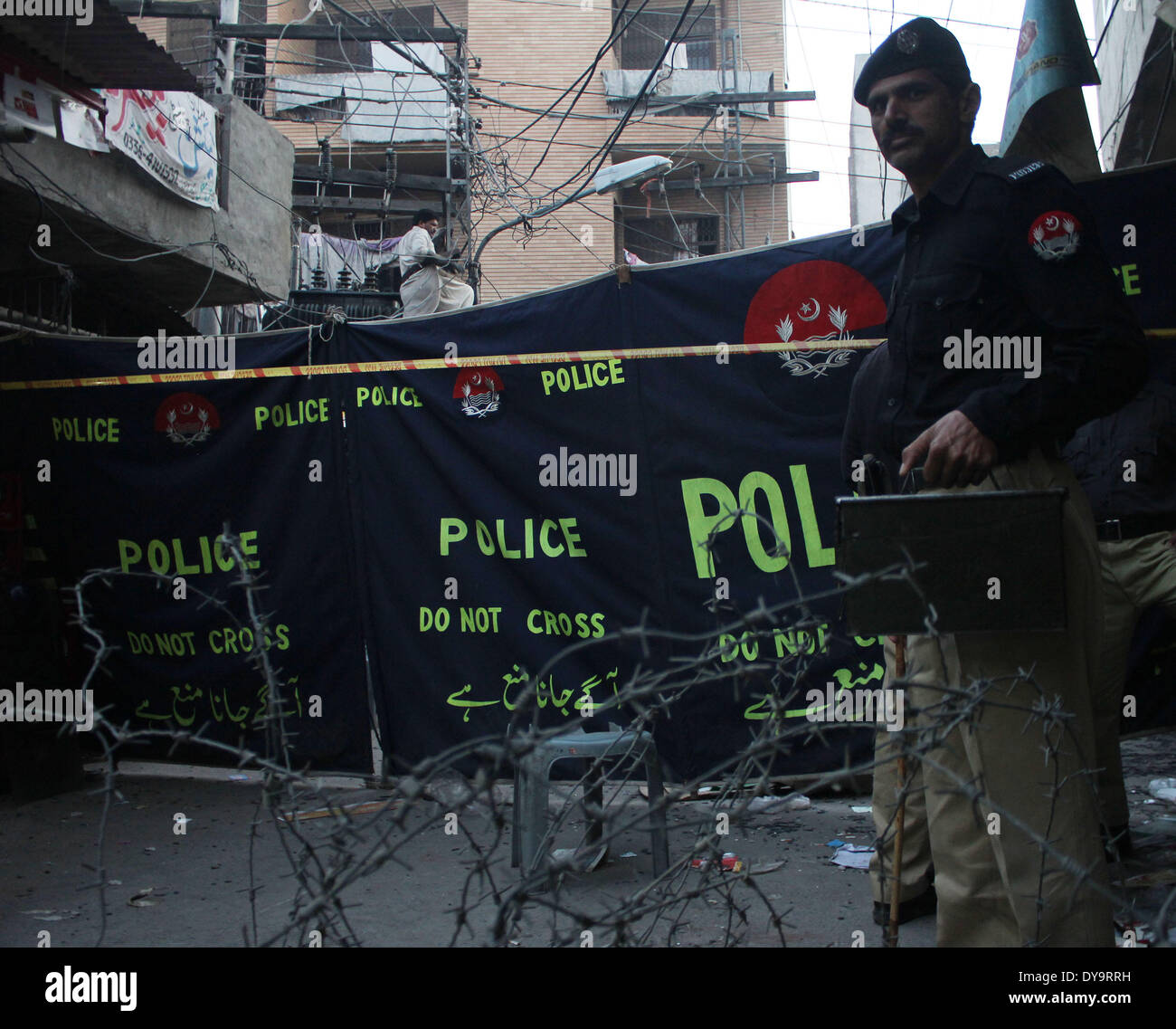Lahore, Pakistan. 11th April, 2014. Pakistani officials collecting the ...