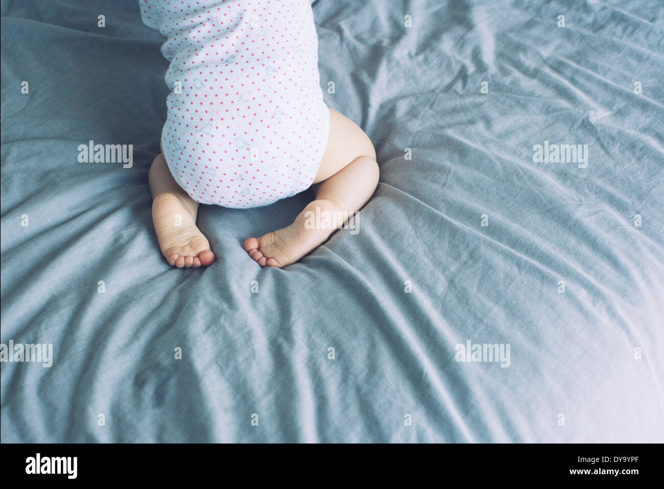 Baby on bed Stock Photo Alamy