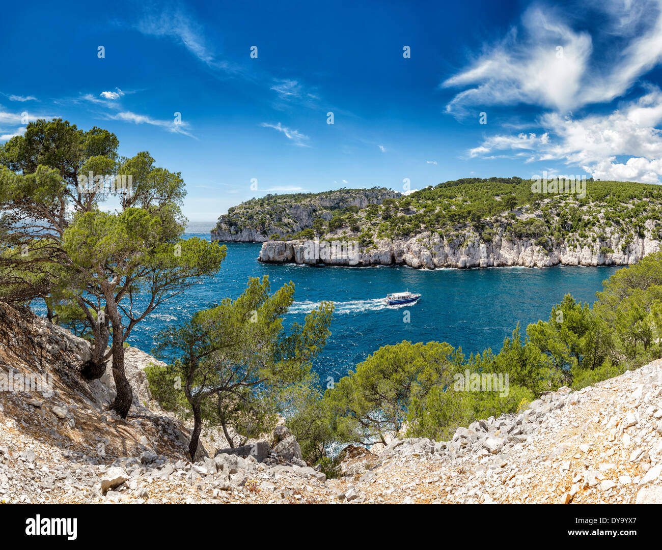 Calanque de Port Miou calanque rocky bay Mediterranean landscape water trees spring mountains sea ships boat Cassis Bouches d Stock Photo