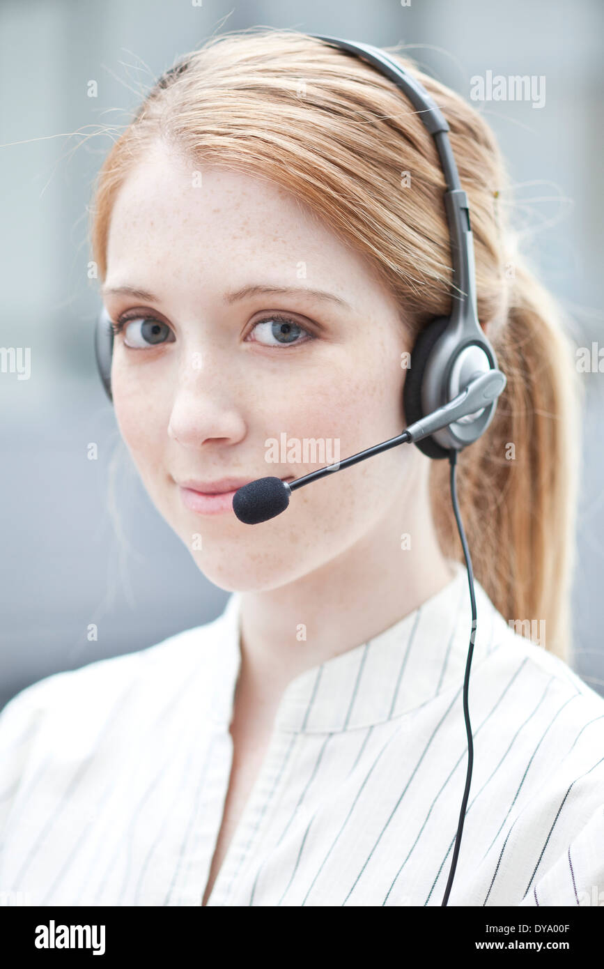 Operator wearing phone headset Stock Photo Alamy