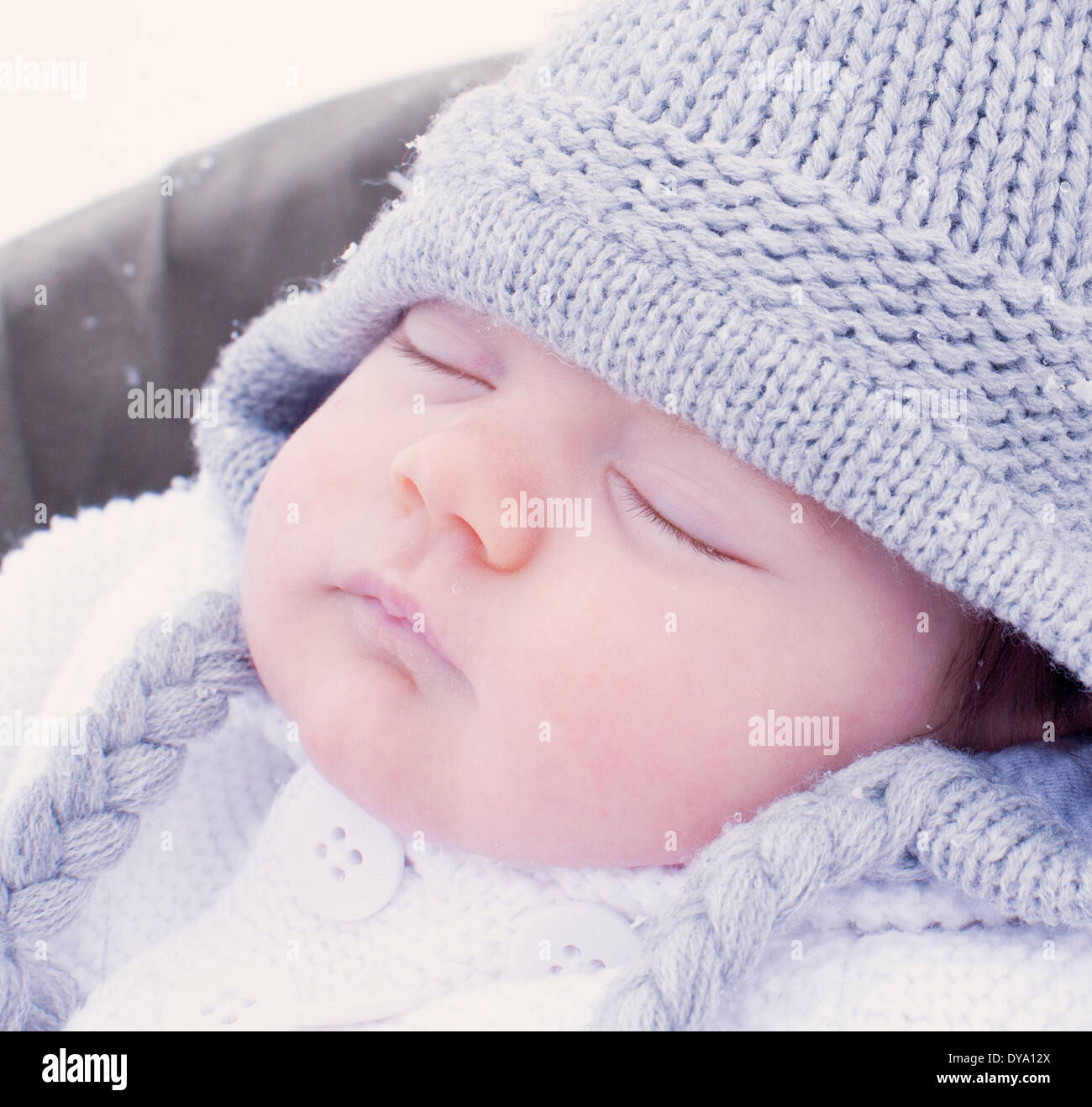 Baby sleeping, wearing knit hat, portrait Stock Photo Alamy
