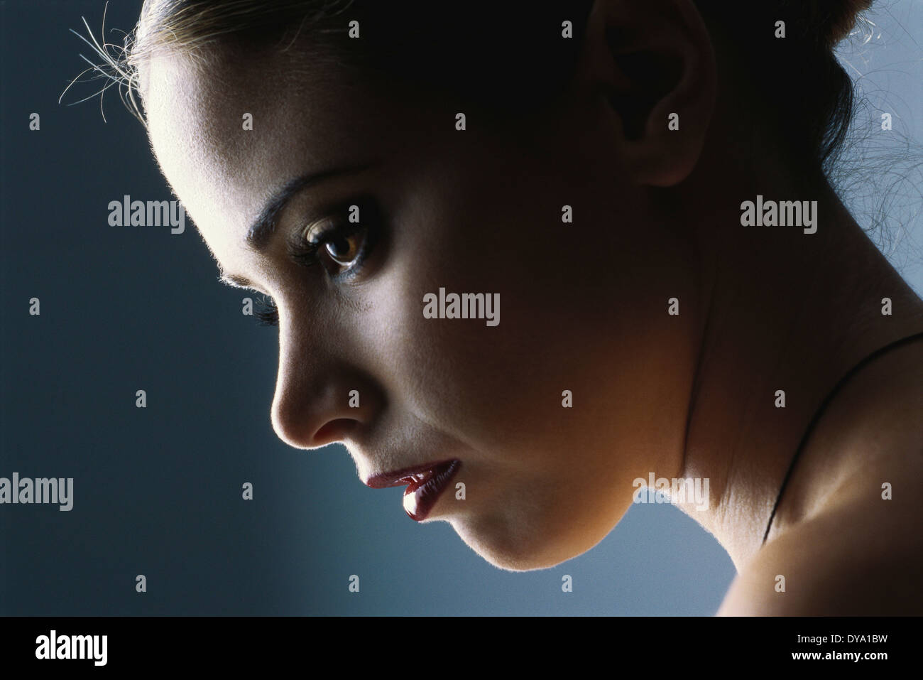 Woman looking down, profile, closeup Stock Photo Alamy