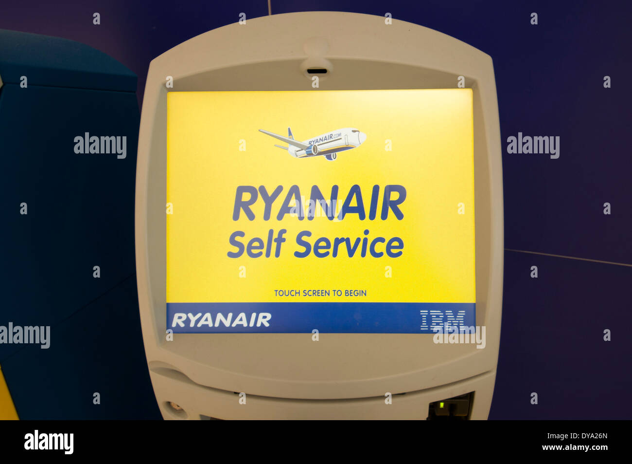 Ryanair self service check in terminal at an airport Stock Photo