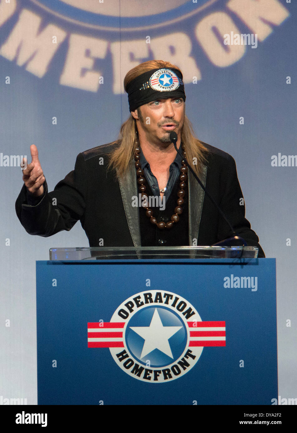 Singer Bret Michaels speaks during the Operation Homefront 6th Annual Military Child of the Year Awards Dinner at the Crystal Gateway Marriott April 10, 2014 in Arlington, Virginia. The Military Child of the Year Award is presented to the military child from each service who demonstrates resiliency, leadership, and achievement. Stock Photo