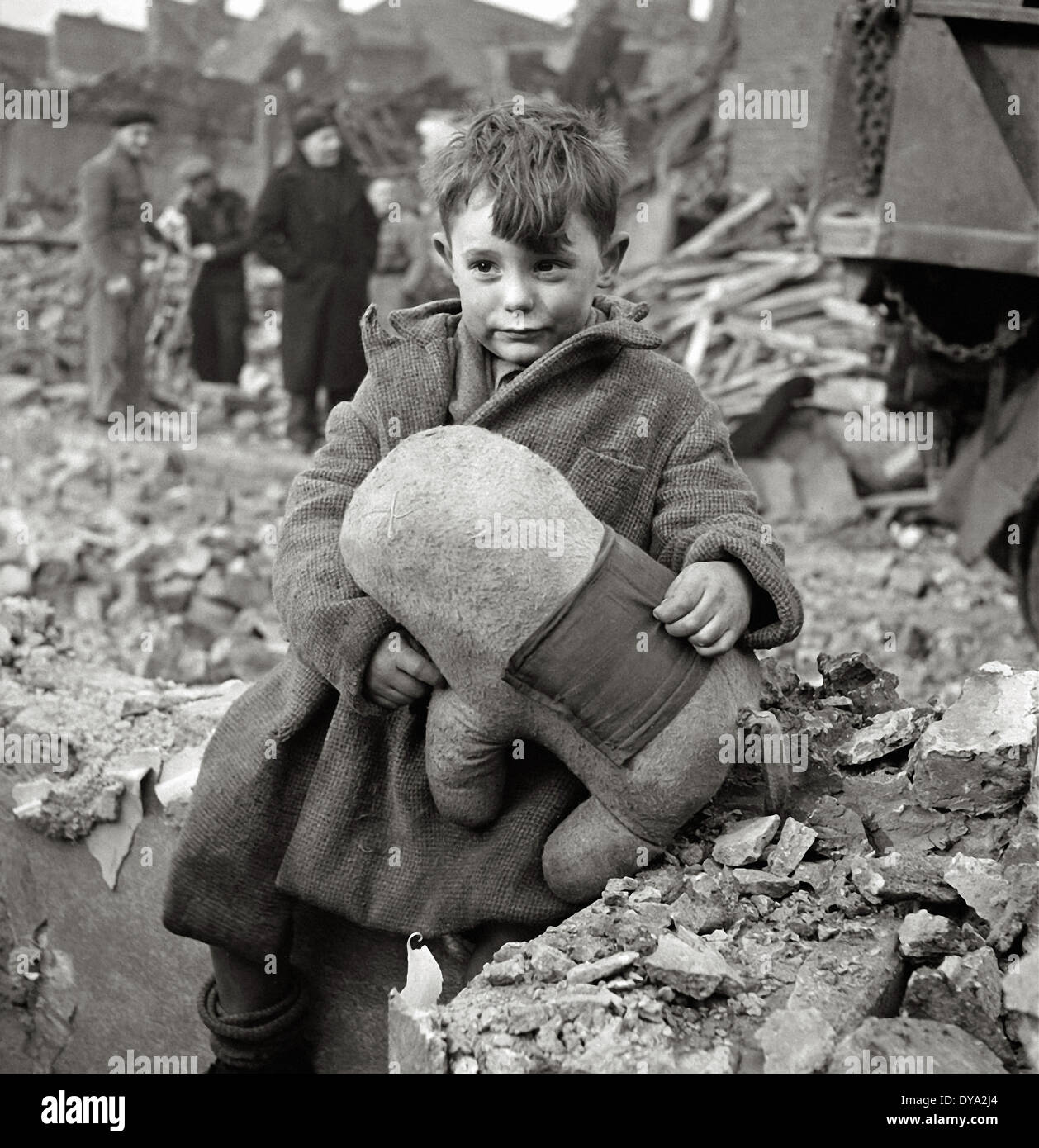 WW II historical war world war second world war England boy soft toy civilian ruins Nazi National Socialist air raids London, Stock Photo