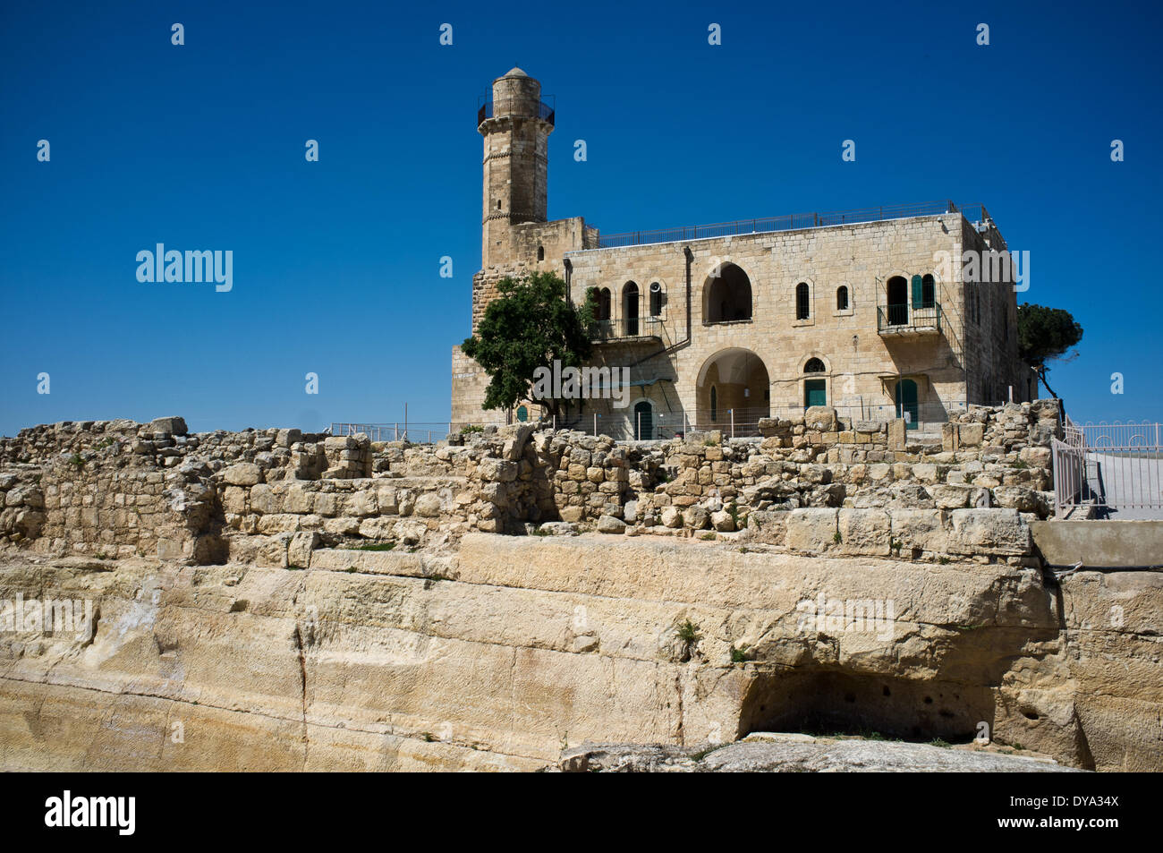 The Tomb of the Prophet Samuel is the traditional burial site of the biblical Samuel, just north of Jerusalem. The tomb is located in an underground chamber inside a small synagogue in the 18th century Nabi Samwil Mosque, built on the remains of a Crusader-era fortress. Archaeological excavations have uncovered a Hellenistic residential area established in the second century BCE by either Seleucid King Antiochus III or Antiochus IV. Stock Photo