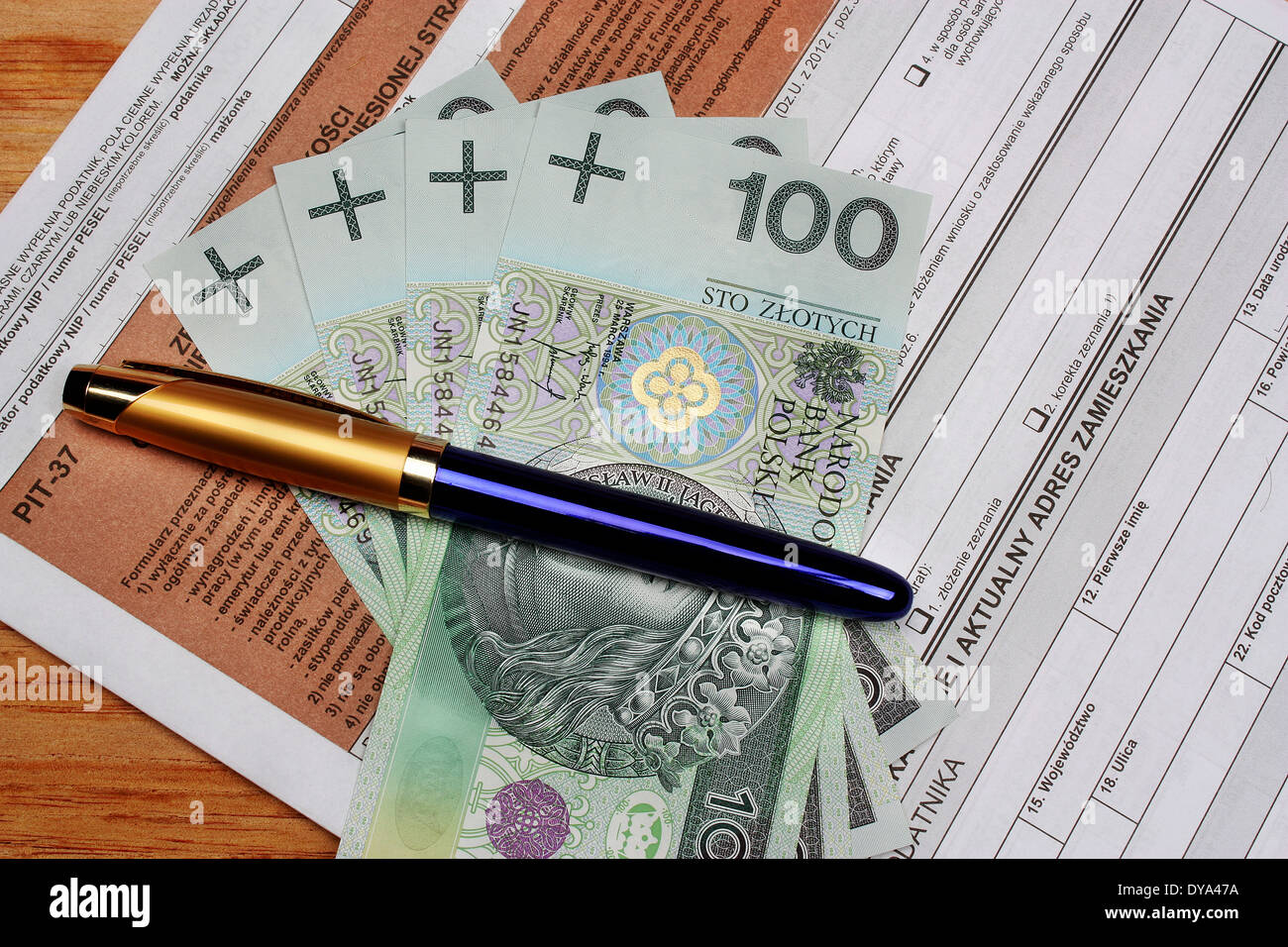 Tax polish individual a pen form filling table Stock Photo Alamy