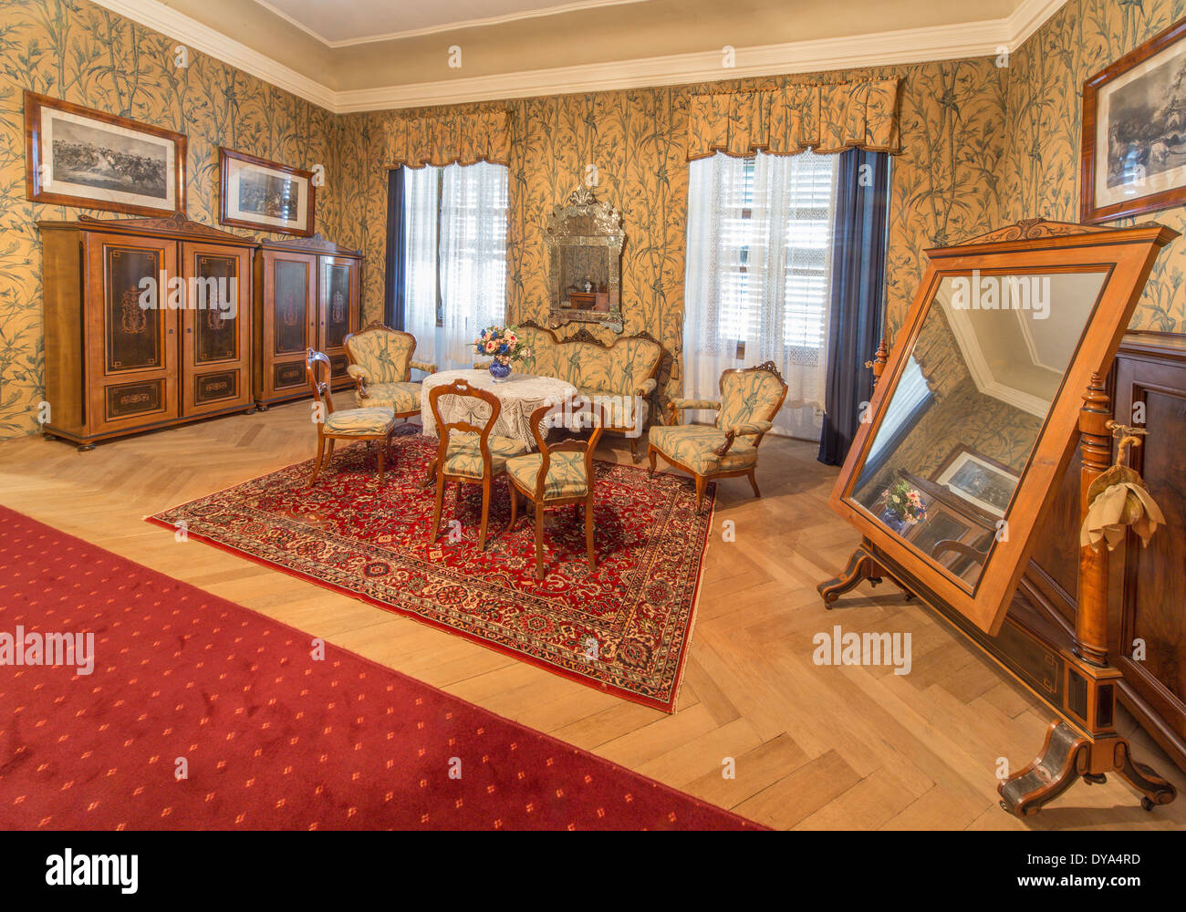 SAINT ANTON, SLOVAKIA - FEBRUARY 27, 2014: Bedroom of guests. Furniture from 19. cent in palace Saint Anton. Stock Photo