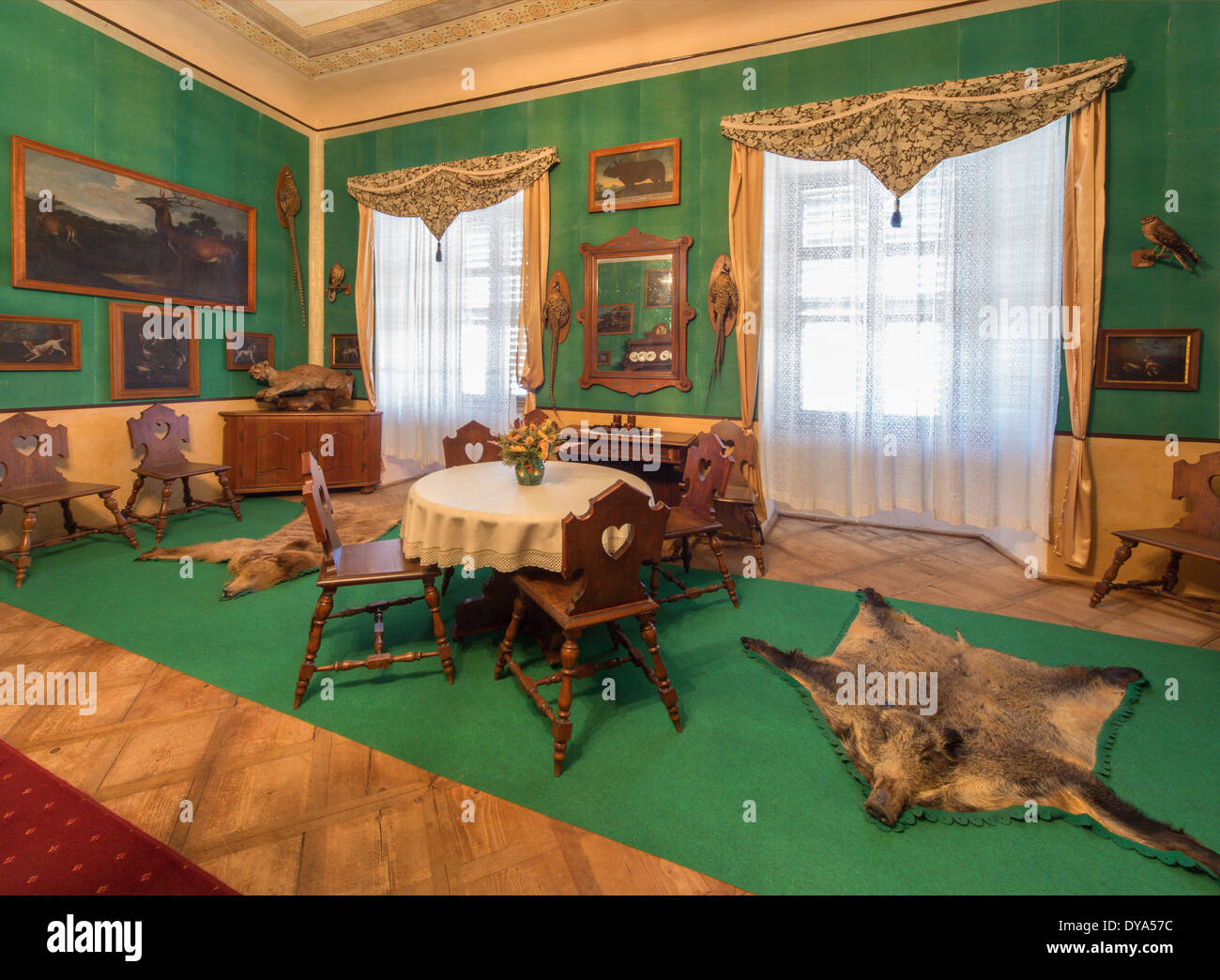 SAINT ANTON, SLOVAKIA - FEBRUARY 26, 2014: Tyrols hunter eating room in palace Saint Anton from 19. cent.. Stock Photo