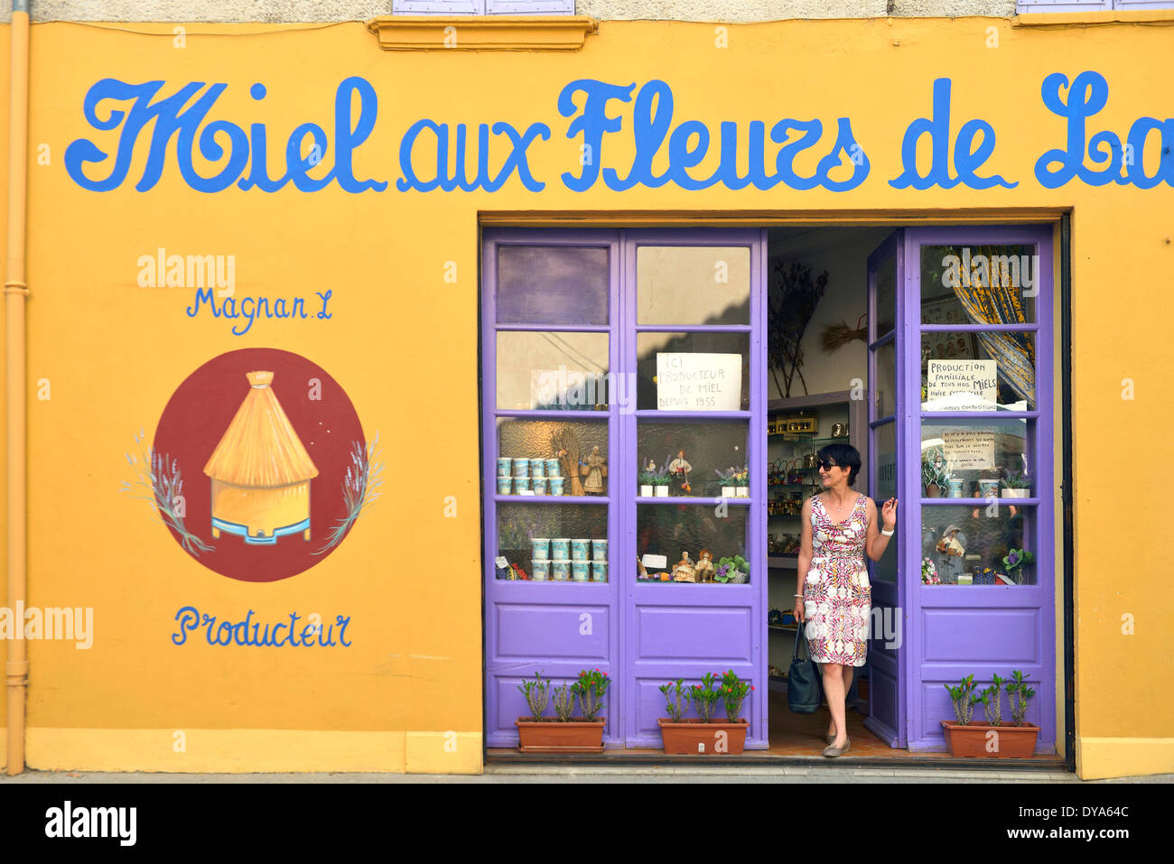 Europe France Provence shop shopping released store french provencal woman brunette Valensole Alpes de Haute Provence, Stock Photo